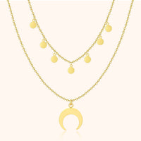Goldene Halskette mit Halbmond-Anhänger und runden Anhängern, modischer Schmuck.