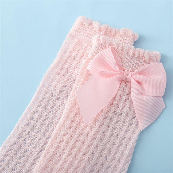 Rosa Baby-Strümpfe mit Schleife, gestrickt, weiches Material, modisch, für Mädchen.