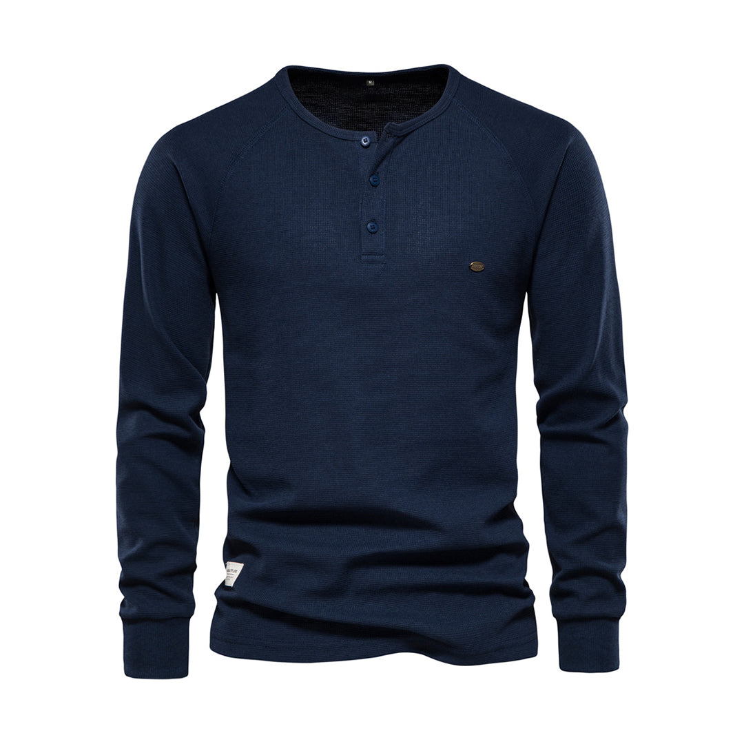 Dunkelblaues Herren-Henley-Shirt, Langarm, Baumwolle, Knopfleiste, Freizeitmode.