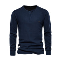 Dunkelblaues Herren-Henley-Shirt, Langarm, Baumwolle, Knopfleiste, Freizeitmode.