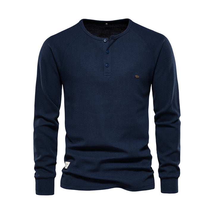 Dunkelblaues Herren-Henley-Shirt, Langarm, Baumwolle, Knopfleiste, Freizeitmode.