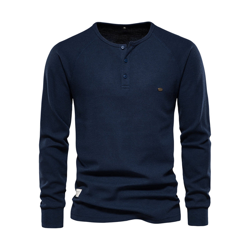Dunkelblaues Herren-Henley-Shirt, Langarm, Baumwolle, Knopfleiste, Freizeitmode.