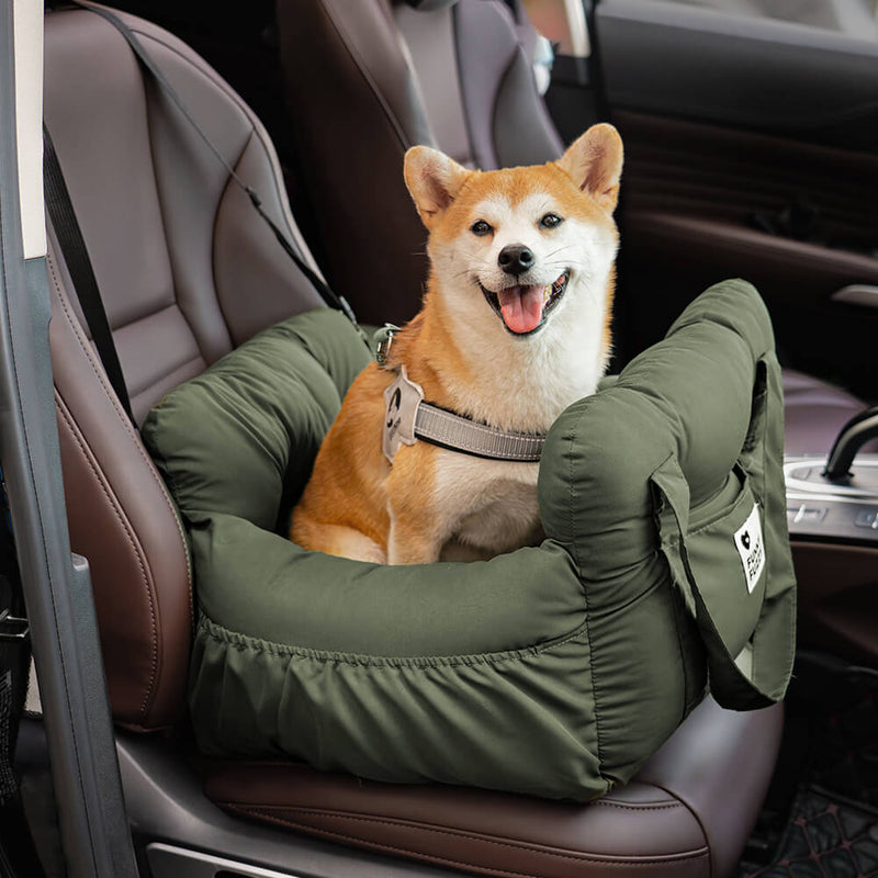 Tragbares dunkelgrünes Hundebett Autositz, ideal für Reisen, Komfort für Haustiere.