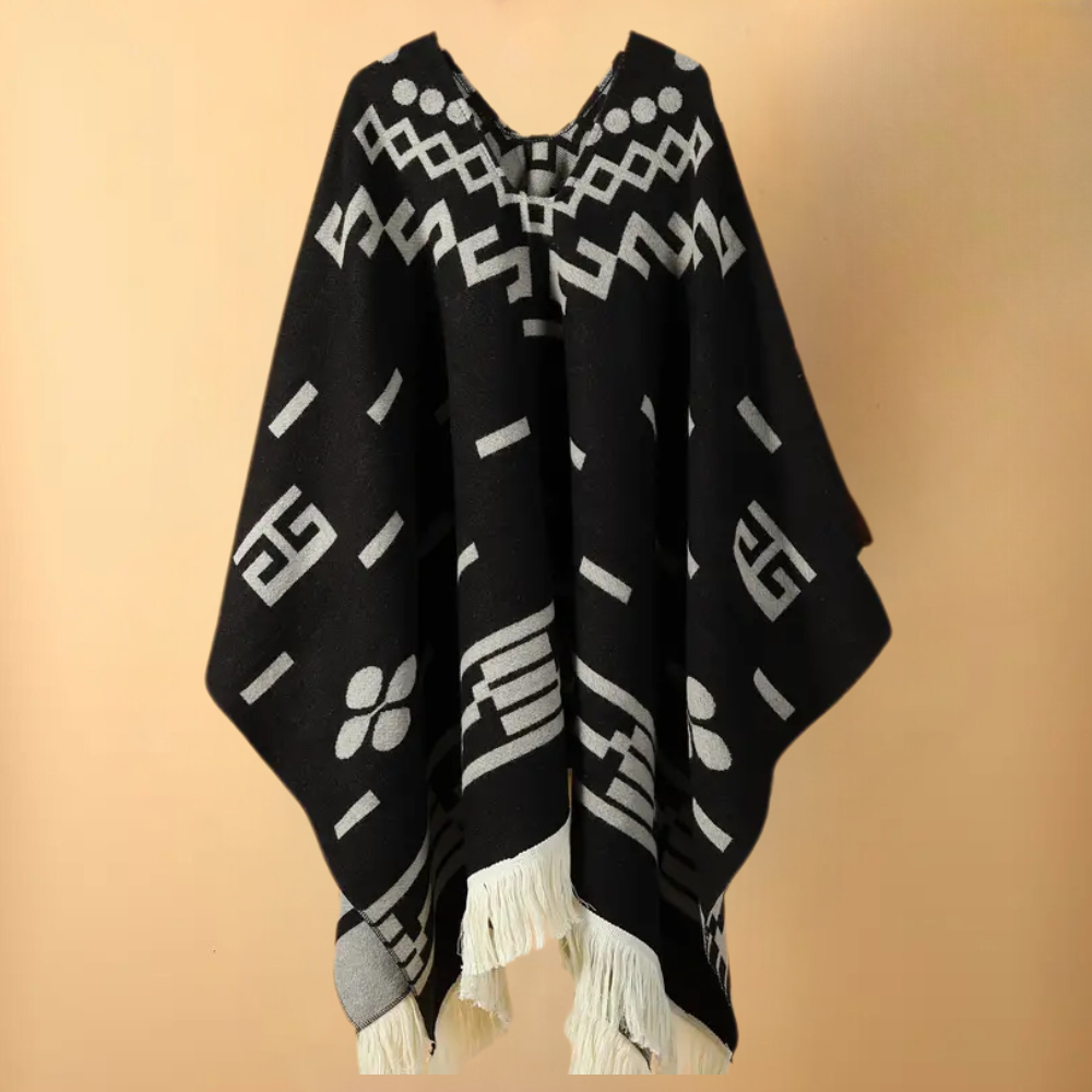 Schwarzer Poncho mit weißen Mustern und Fransen, Damenmode, Boho-Stil, Baumwolle.