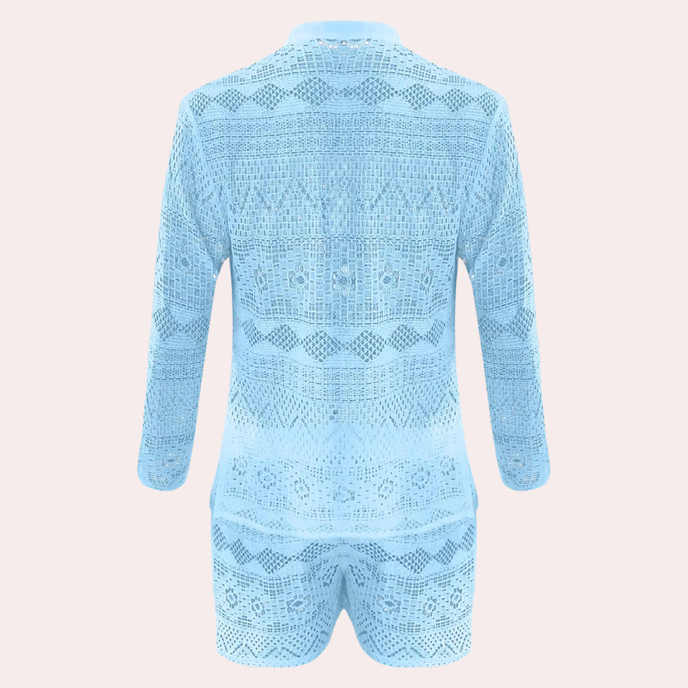 Hellblauer Spitzen-Jumpsuit, langärmlig, geometrisches Muster, modisch, Damenbekleidung.