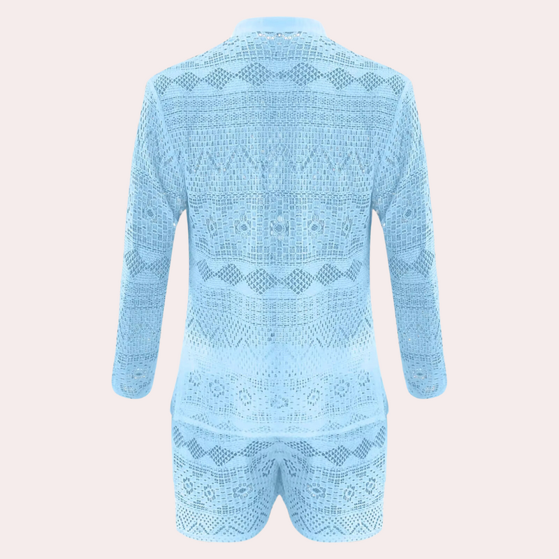 Hellblauer Spitzen-Jumpsuit, langärmlig, geometrisches Muster, modisch, Damenbekleidung.