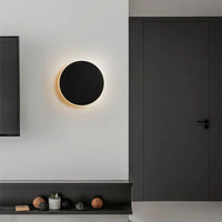Minimalistische schwarze Wandleuchte, energiesparend, rund, modernes Design, Wohnzimmer.
