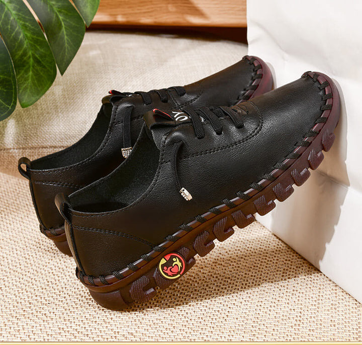 Schwarze Lederschuhe mit rutschfester Sohle, lässig, bequem, für Herren.