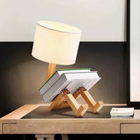 Holzlampenhalter in Form eines Lesenden mit Buch, moderne Tischlampe, skandinavisches Design.