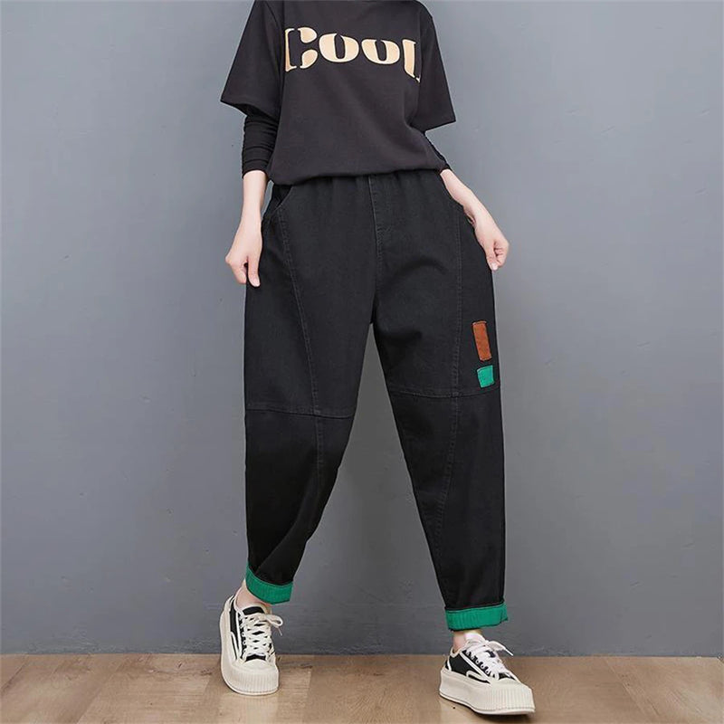 Schwarze Baggy-Jeans Damen, lässig, mit grünem Saum, modisch, Streetwear, Baumwolle.