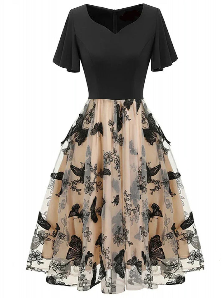 Herbstliches Midikleid aus Mesh mit Stickerei & Volantärmeln – Maila