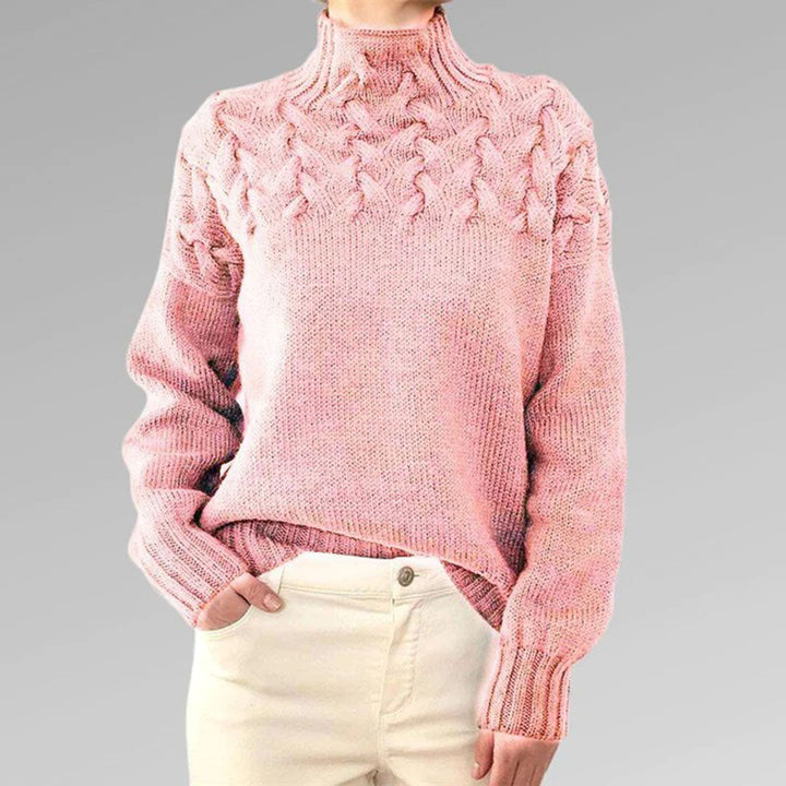Rosa Strickpullover Damen, Zopfmuster, hoher Kragen, Baumwolle, modisch, bequem, Herbstmode.