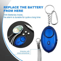 Blauer persönlicher Alarm mit Schlüsselanhänger, Batteriefach, Sicherheitsgerät.