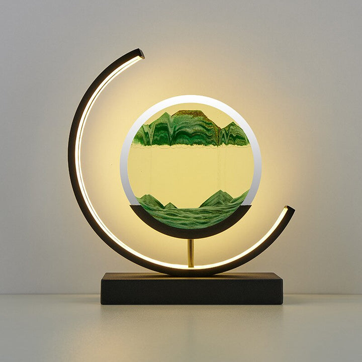 Moderne Sanduhrlampe mit LED, runder Rahmen, grün-gelber Sand, dekorative Tischleuchte.