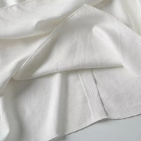 Weiße luftige & stylische ärmellose Leinenbluse für Damen – Amira