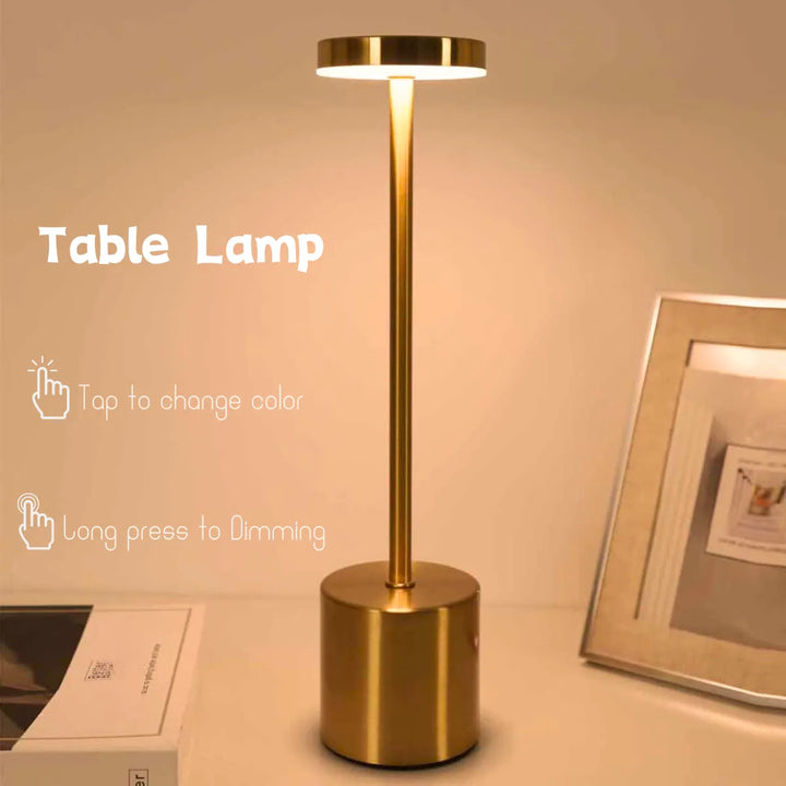 Goldene LED-Tischlampe, dimmbar, modernes Design, Touch-Steuerung, warmweißes Licht.