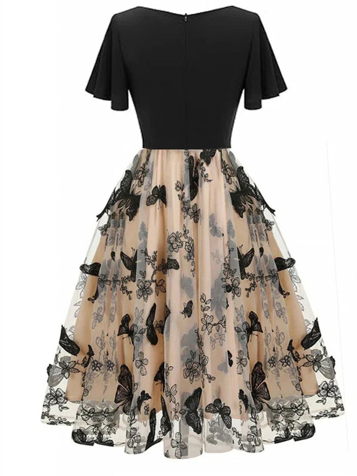 Herbstliches Midikleid aus Mesh mit Stickerei & Volantärmeln – Maila