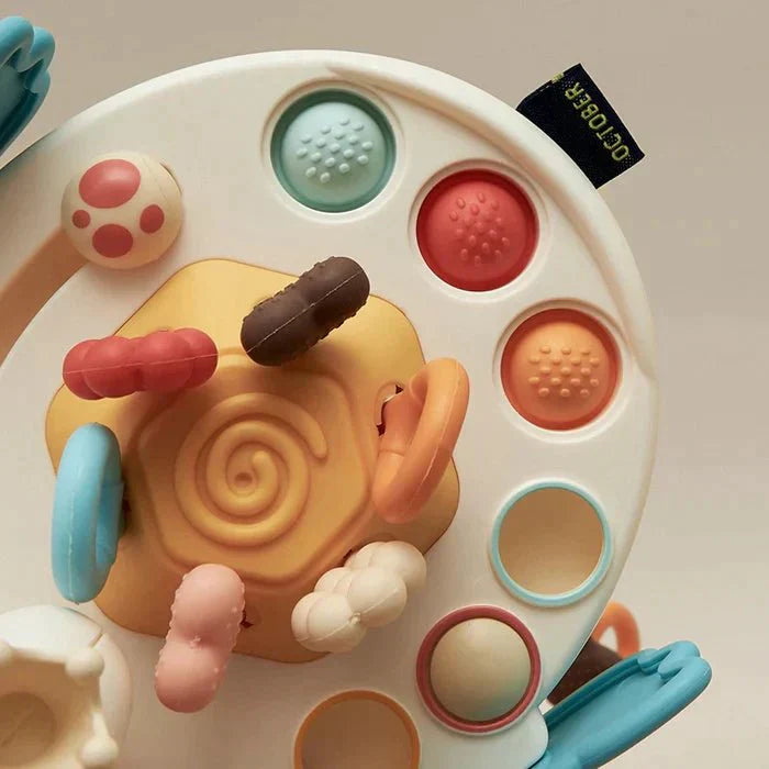 Juno Sensorisches UFO Spielzeug – Zieh & Entdecke Aktivitätsspielzeug für Babys