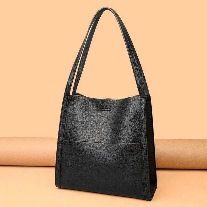 Schwarze Lederhandtasche mit langen Henkeln, elegantes Design, Damenmode Accessoire.