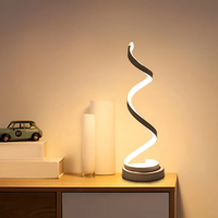 Moderne LED-Tischlampe, spiralförmig, warmweißes Licht, minimalistisches Design, Wohnzimmer-Dekor.