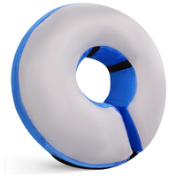 Graues und blaues orthopädisches Sitzkissen, ergonomisch, rund, für Komfort und Unterstützung.