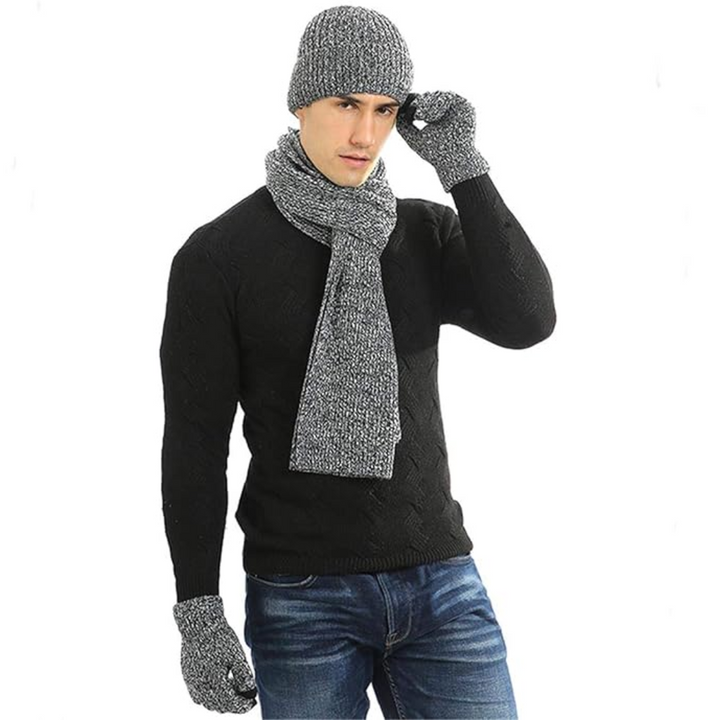 Mann mit grauem Strickmütze, Schal und Handschuhen, schwarzer Pullover, Wintermode.