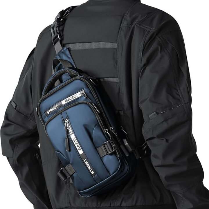 Dunkelblaue Umhängetasche für Herren, Streetwear-Design, mit mehreren Reißverschlüssen.