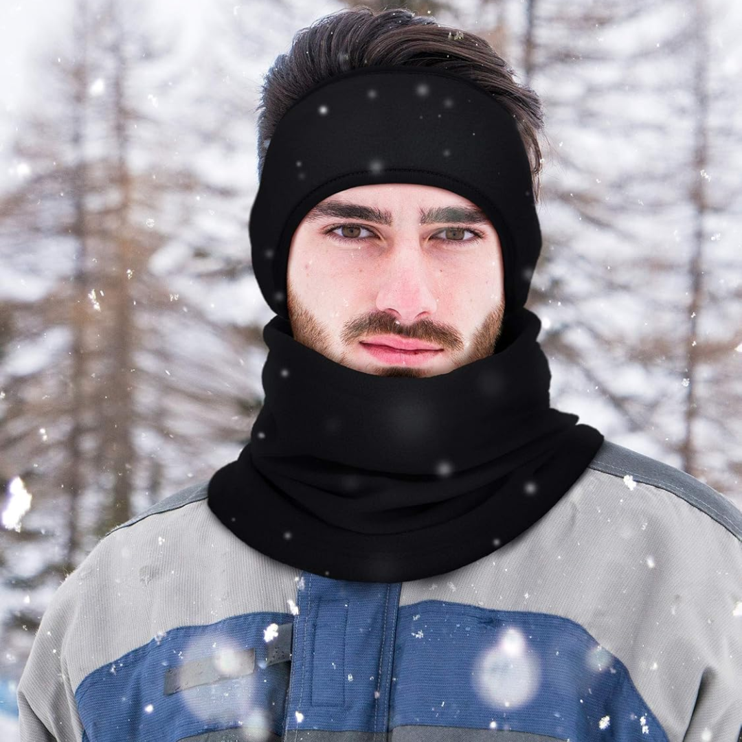 Mann mit schwarzem Winter-Schal und Stirnband im Schnee, Outdoor-Bekleidung, Wintermode.