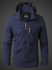 Dunkelblaue Outdoor-Jacke, wasserdicht, winddicht, mit Kapuze und Reißverschlüssen.