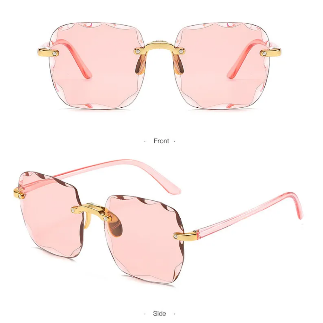 Vintage randlose Sonnenbrille, rosa Gläser, goldene Bügel, modisches Accessoire.
