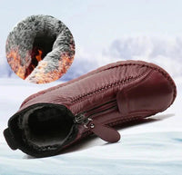 Warme, rutschfeste, braune Lederstiefel mit Reißverschluss und Fellfutter für den Winter.