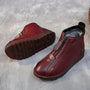Warme, rutschfeste, bequeme, rote Lederstiefel mit Reißverschluss für Damen.
