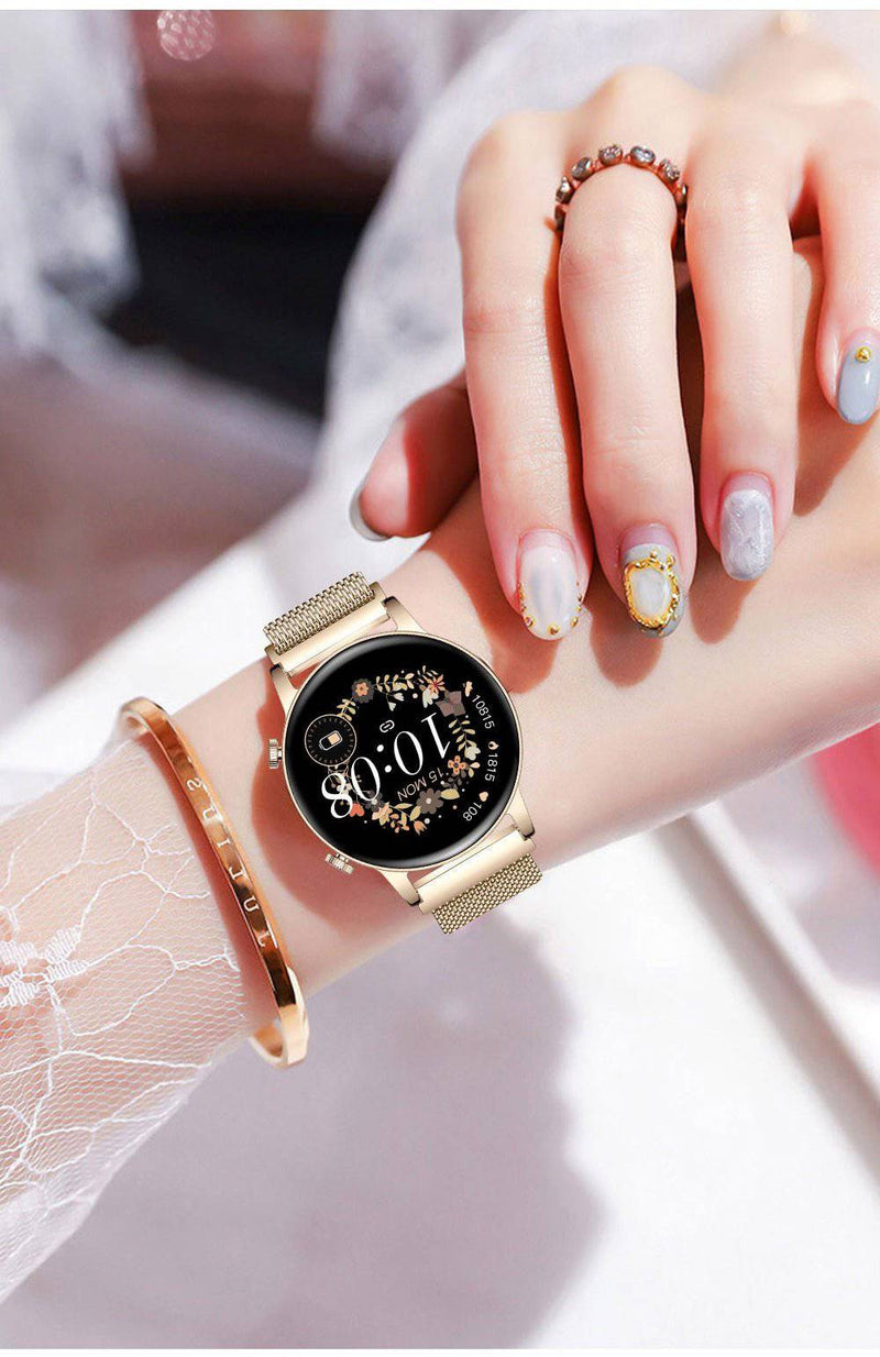 Goldene Damen-Smartwatch mit rundem Zifferblatt und Blumenmuster, elegantes Design.