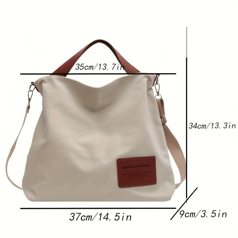Beige Canvas Schultertasche mit braunen Griffen, lässig, geräumig, modisch, Damenaccessoire.