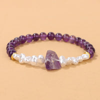 Armband aus Amethyst und Perlen, lila und weiß, Schmuck für Damen, Edelstein-Accessoire.
