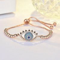 Roségoldenes Armband mit blauem Auge-Anhänger, Kristallverzierung, verstellbar, modisch.