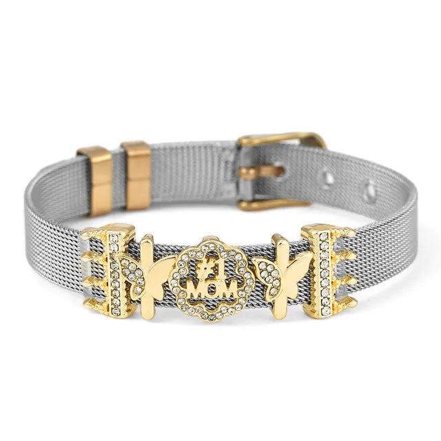 Goldenes Armband mit Schmetterlingsdesign, Strasssteinen und verstellbarem Verschluss.