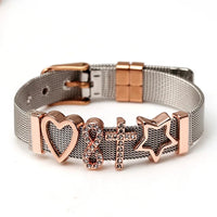 Armband aus Edelstahl mit roségoldenen Charms, Herz, Unendlichkeit, Kreuz, Stern, Damenmode.