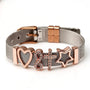 Armband aus Edelstahl mit roségoldenen Charms, Herz, Unendlichkeit, Kreuz, Stern, Damenmode.