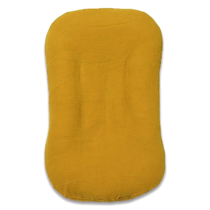 Gelbes Baby-Kopfkissen aus Baumwolle, ergonomisch, atmungsaktiv, für Neugeborene.