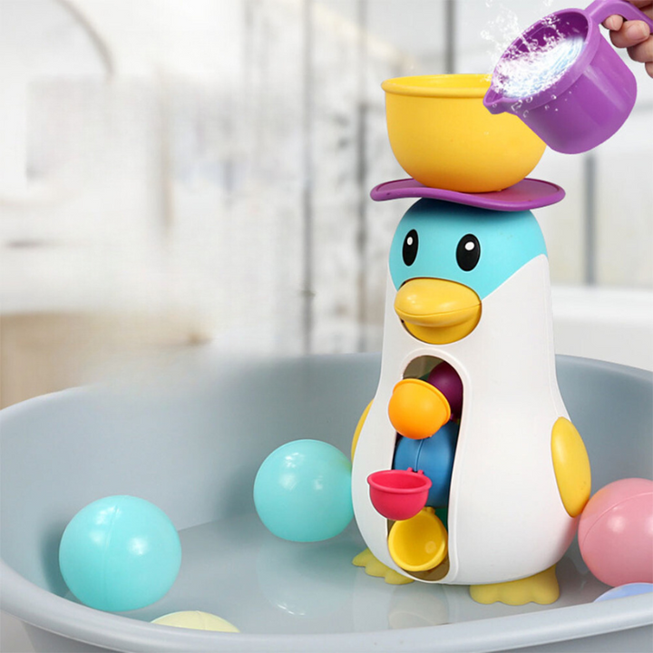 Badespielzeug Pinguin mit bunten Bällen, Wasserbecher, Kinder Badewanne Spielzeug, Kunststoff.