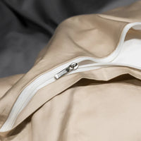 Beige Bettbezug mit Reißverschluss, Baumwolle, luxuriös, langlebig, Schlafzimmertextilien.