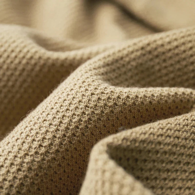 Beige Waffelstrickstoff, Nahaufnahme, Textur, Baumwolle, Bekleidungsstoff, Detailansicht