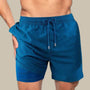 Männer-Badehose blau, geometrisches Muster, Kordelzug, schnell trocknend, Strandmode.