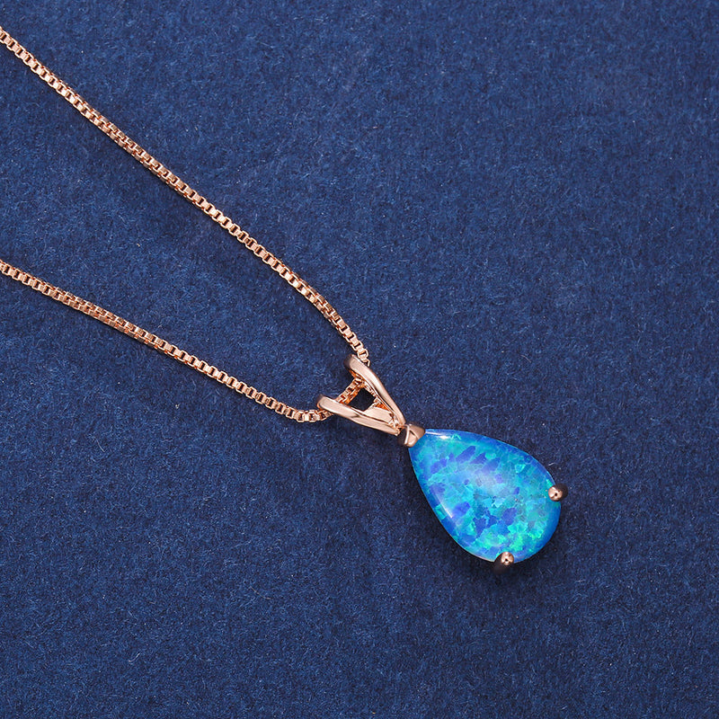 Opal-Anhänger Halskette, Tropfenform, blau-grün, Roségold, eleganter Schmuck, Damenaccessoire.