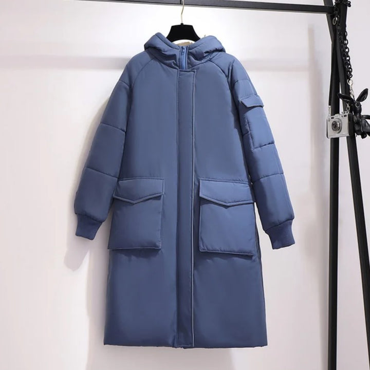 Blauer Damen-Wintermantel mit Kapuze, wattiert, lange Ärmel, große Taschen, modisch.