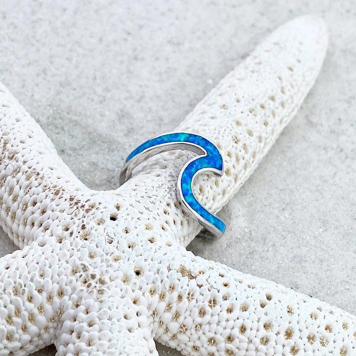Silberring mit blauem Opal-Wellen-Design auf Seestern, eleganter Schmuck für Damen.
