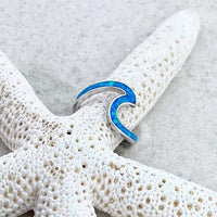 Silberring mit blauem Opal-Wellen-Design auf Seestern, eleganter Schmuck für Damen.
