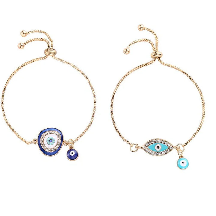 Zwei goldene Armbänder mit blauen Nazar-Anhängern, verstellbar, modisch, Damen-Schmuck.