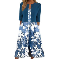 Blaues Damenkleid mit Blumenmuster, knielang, 3/4-Ärmel, elegant, Sommermode.